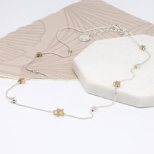 Load image into Gallery viewer, Silver And Gold Star Necklace
