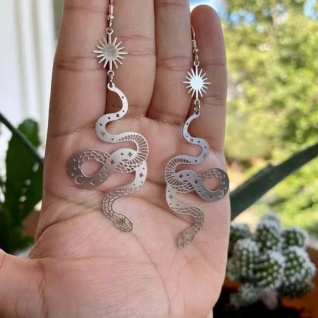 Serpent Silver Earrings With A Star