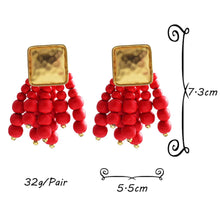 Load image into Gallery viewer, Statement Wood Beaded Gold Earrings
