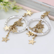 Load image into Gallery viewer, Worn Gold Star Cluster And Silver Hoop Earrings
